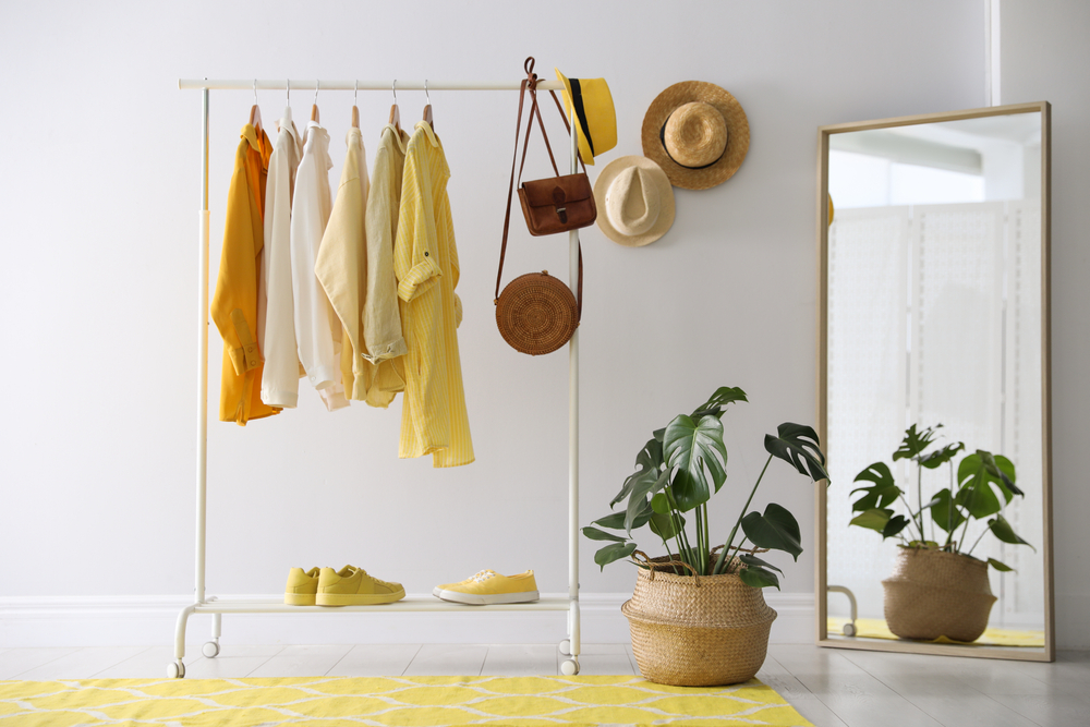 Handing hats and displaying clothes as decorative pieces is an easy decorative idea | Swoosh Finance